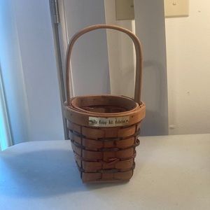 Sturdy vertical Bishop Hill Collection basket; handle; red, green, blue detail